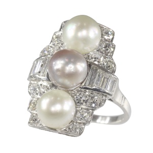 Geometric Glamour: An Art Deco Diamond and Pearl Ring
